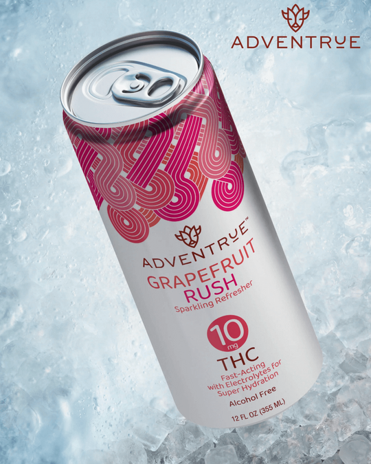 Adventrue Grapefruit Rush sparkling refresher can on ice with 'Adventrue' branding